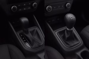side by side comparison of two modern car gear shifters, with an automatic transmission lever on the left and a manual six speed gear stick on the right, both set in black leather trimmed center consoles