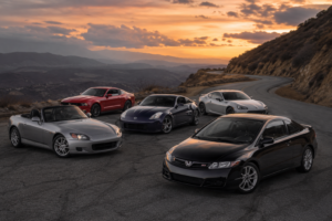 Affordable used sports cars on a scenic mountain road at sunset, featuring popular enthusiast cars like the Honda Civic Si, Nissan 350Z, Subaru BRZ, Ford Mustang GT, and Honda S2000 for budget-minded drivers.